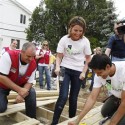 Savannah Guthrie, center, joins Dennis Knowles from Lowe's, left, and Sandy Dias to build a deck as part of Rebuilding Together's volunteer day in Gerritsen Beach in Brookyln, N.Y. to renovate homes damaged by Hurricane Sandy on Thursday, June 6, 2013. (Amy Sussman/AP Images for Rebuilding Together)