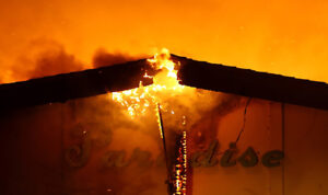 On Nov. 12, 2018, a healthcare facility in Paradise, CA, was consumed by flames from the Camp Fire. Photo: High County News