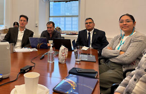 Team discussing Leveraging Two-Way Communications to Bridge Tribal Voices